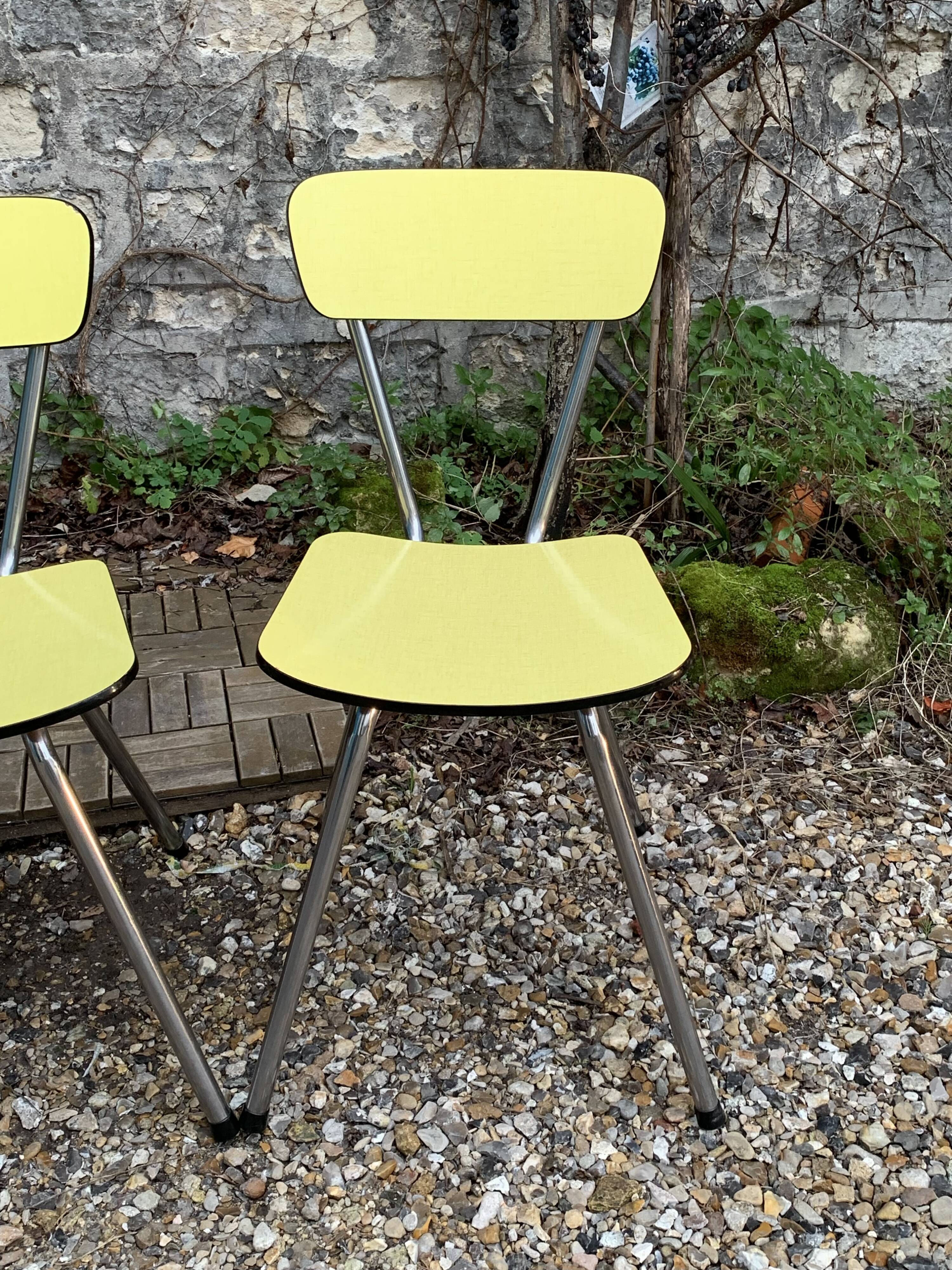 Yellow Formica chairs with compass legs, 1950s