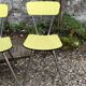 Yellow Formica chairs with compass legs, 1950s