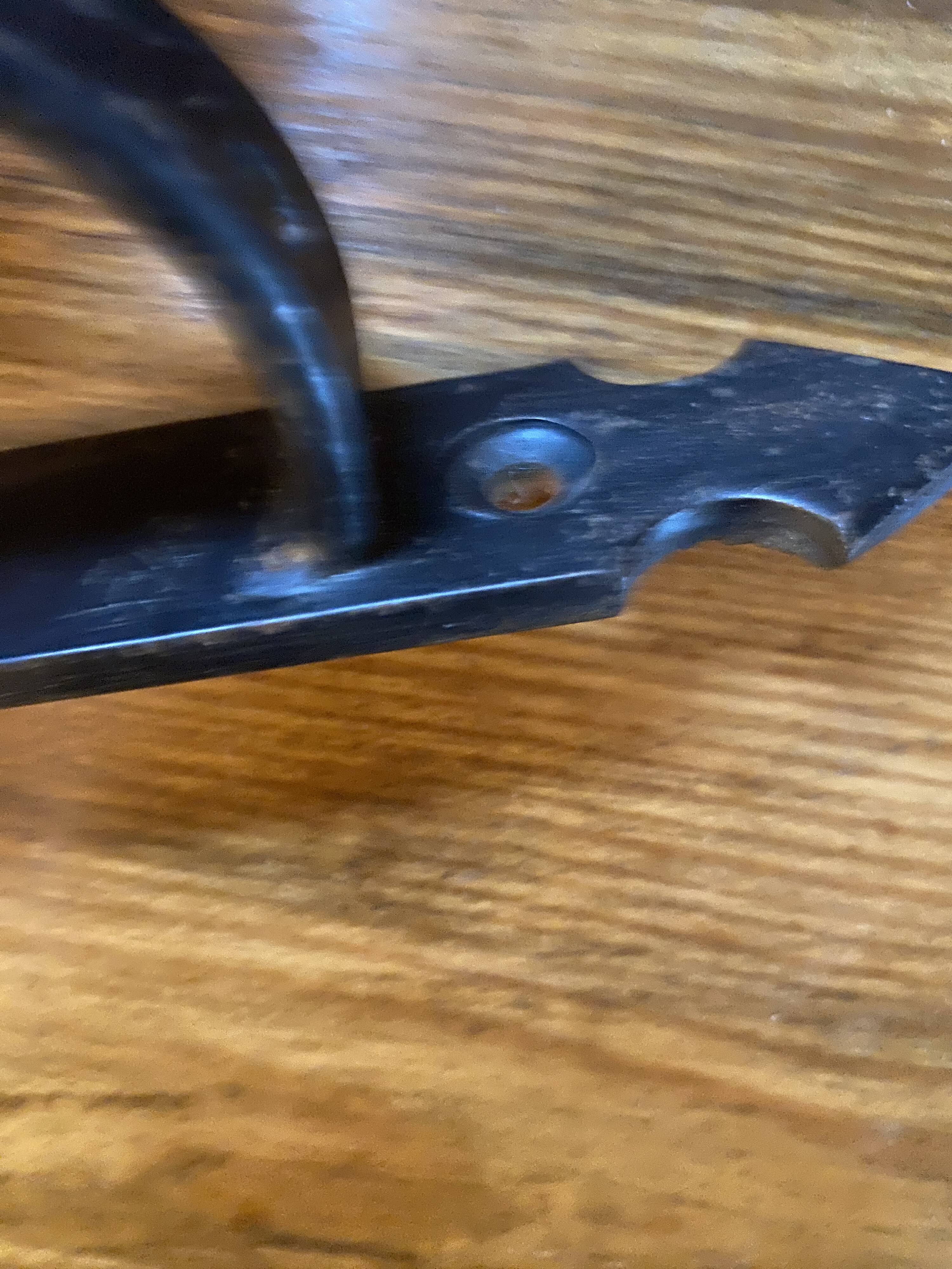 Wrought iron wall light, fabric cable