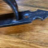 Wrought iron wall light, fabric cable