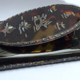 Silver and tortoiseshell letter clip