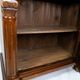 Glass cabinet of light walnu from the 1880s