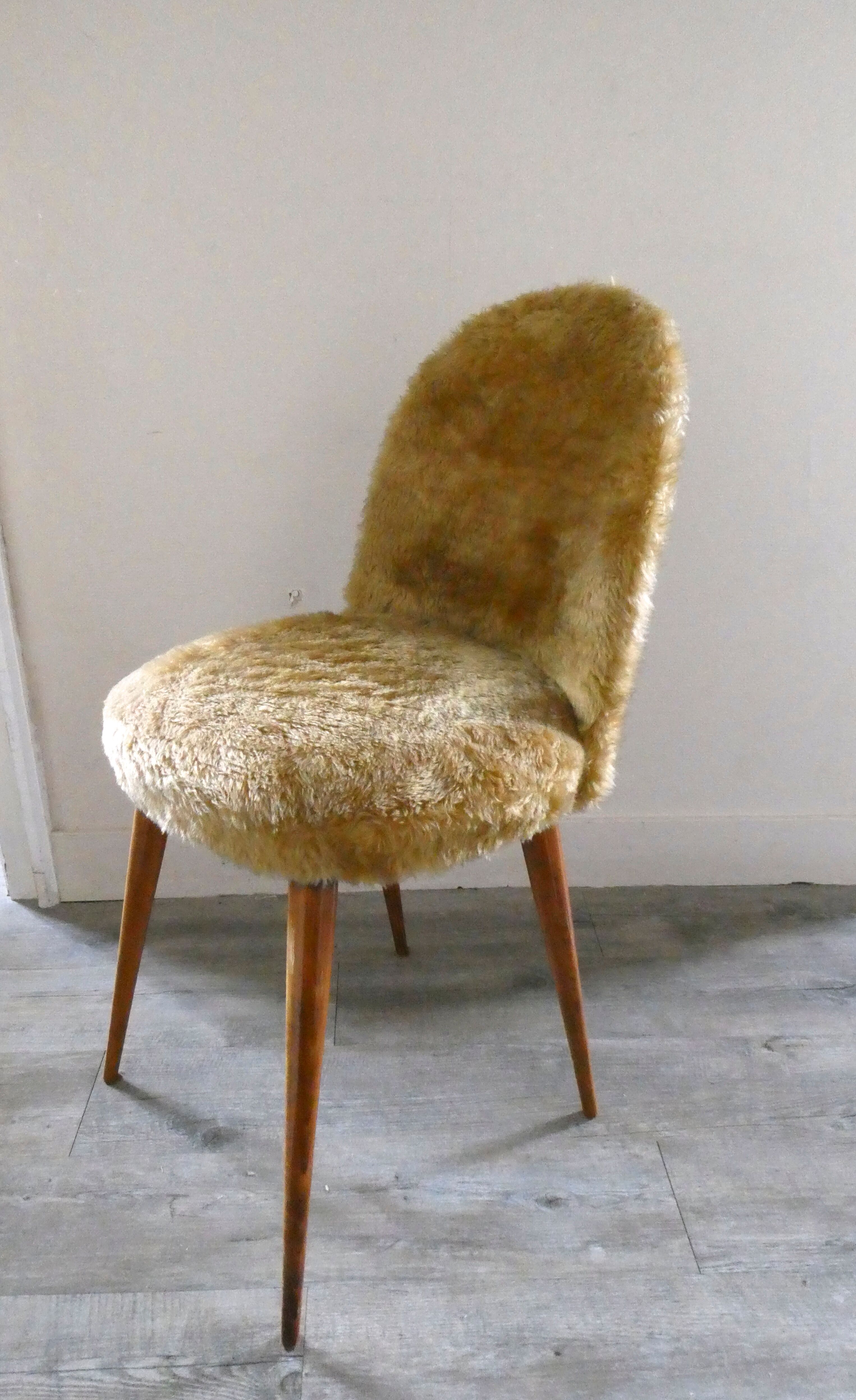Golden moumoute chair, wooden compass feet, 60s