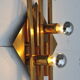 Pair of vintage geometric brass wall lamps