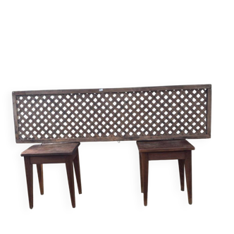 Headboard and its two wooden bedside tables.