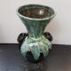 Old black enamelled ceramic Gaubier vase with green white vintage drips