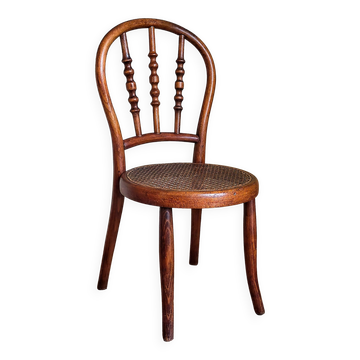 Children's chair in curved round wood old year