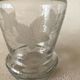 Small carafe in blown cut glass with engraved decoration of vine leaves and grapes, threaded stopper