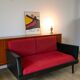Canapé Day Bed en skaï, tissus rouge chiné et métal noir 1950