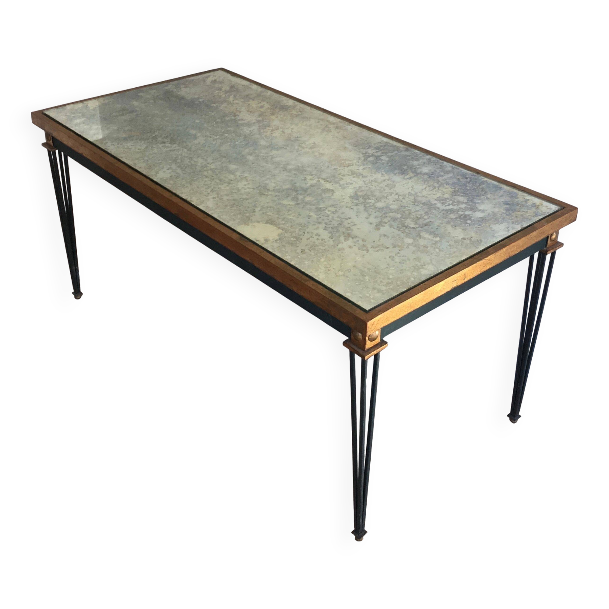 Patinated and gilded steel coffee table in the style of Jacques Quinet.