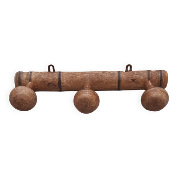 Wall-mounted coat rack in antique wood