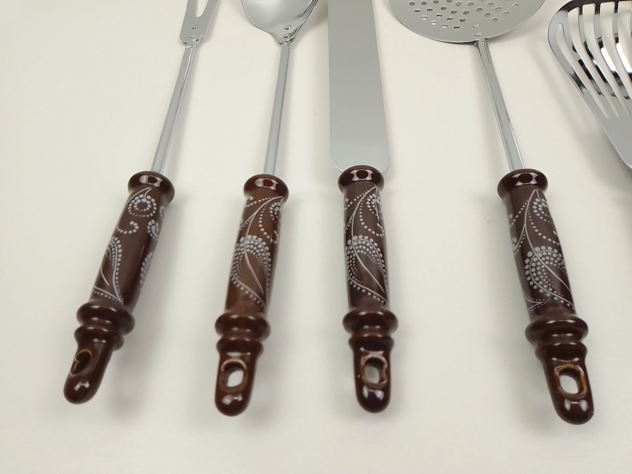 6 kitchen utensils brown ceramic sleeves
