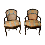 Convertible armchairs Louis XV era in walnut moulded and cannes