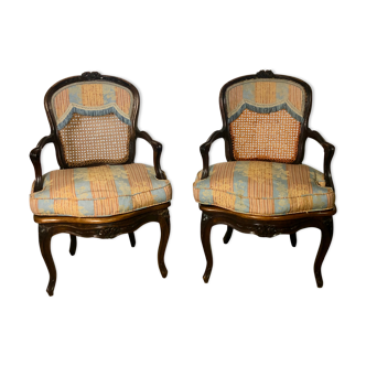 Convertible armchairs Louis XV era in walnut moulded and cannes