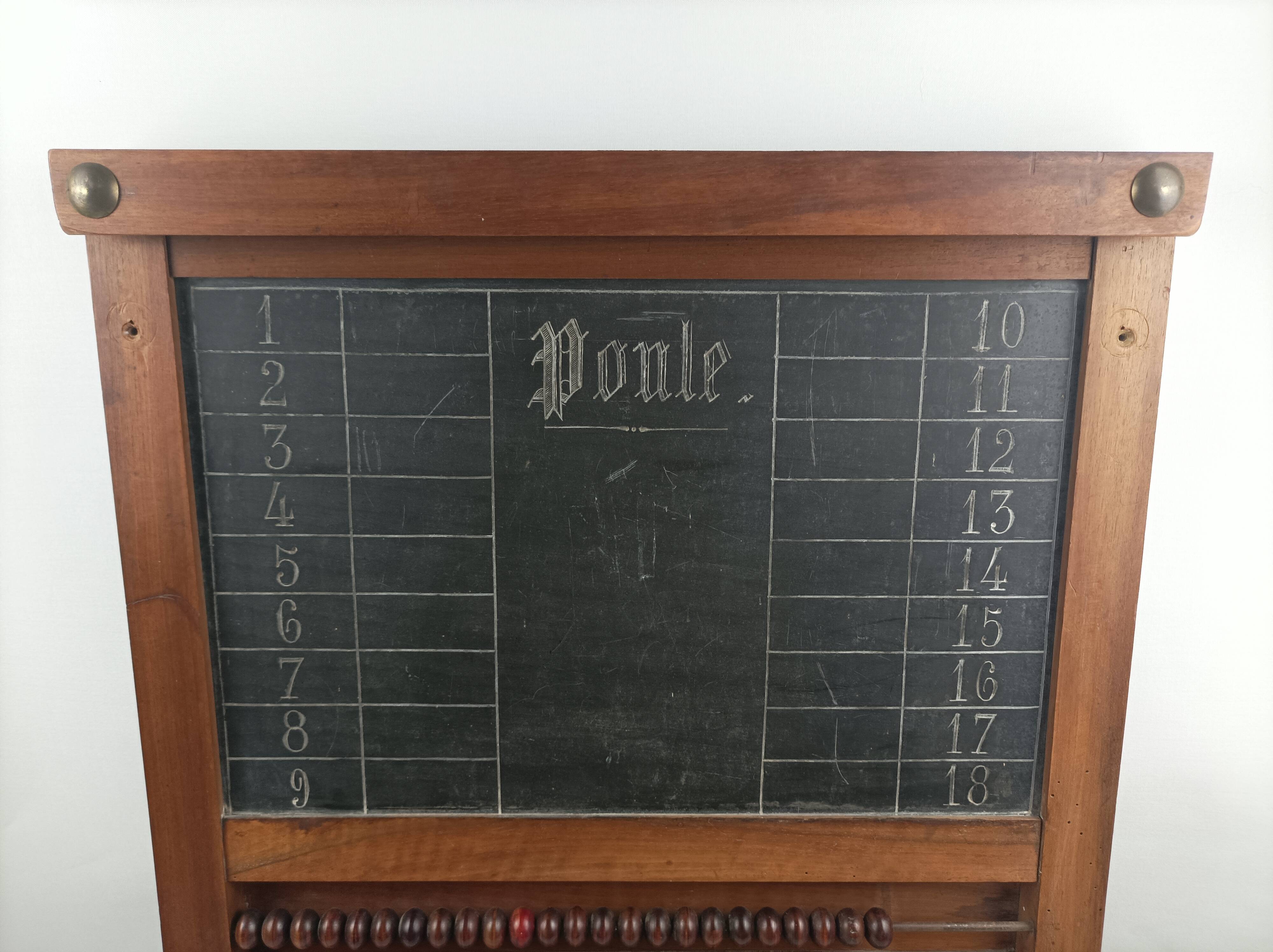 Old billiard abacus with branded slate