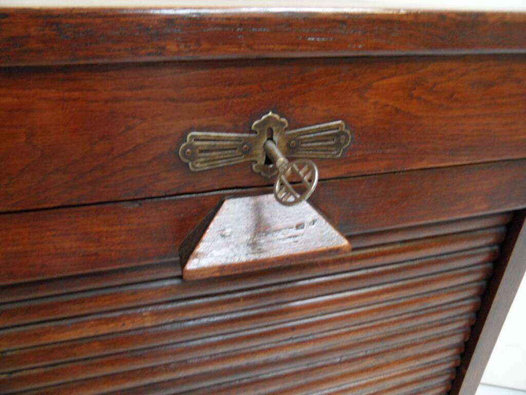 Antique filing cabinet with roller shutter