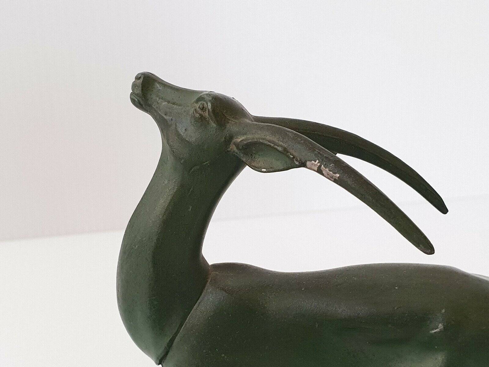 Pair of vintage ibex bookends from 1940-1950 in marble and metal.