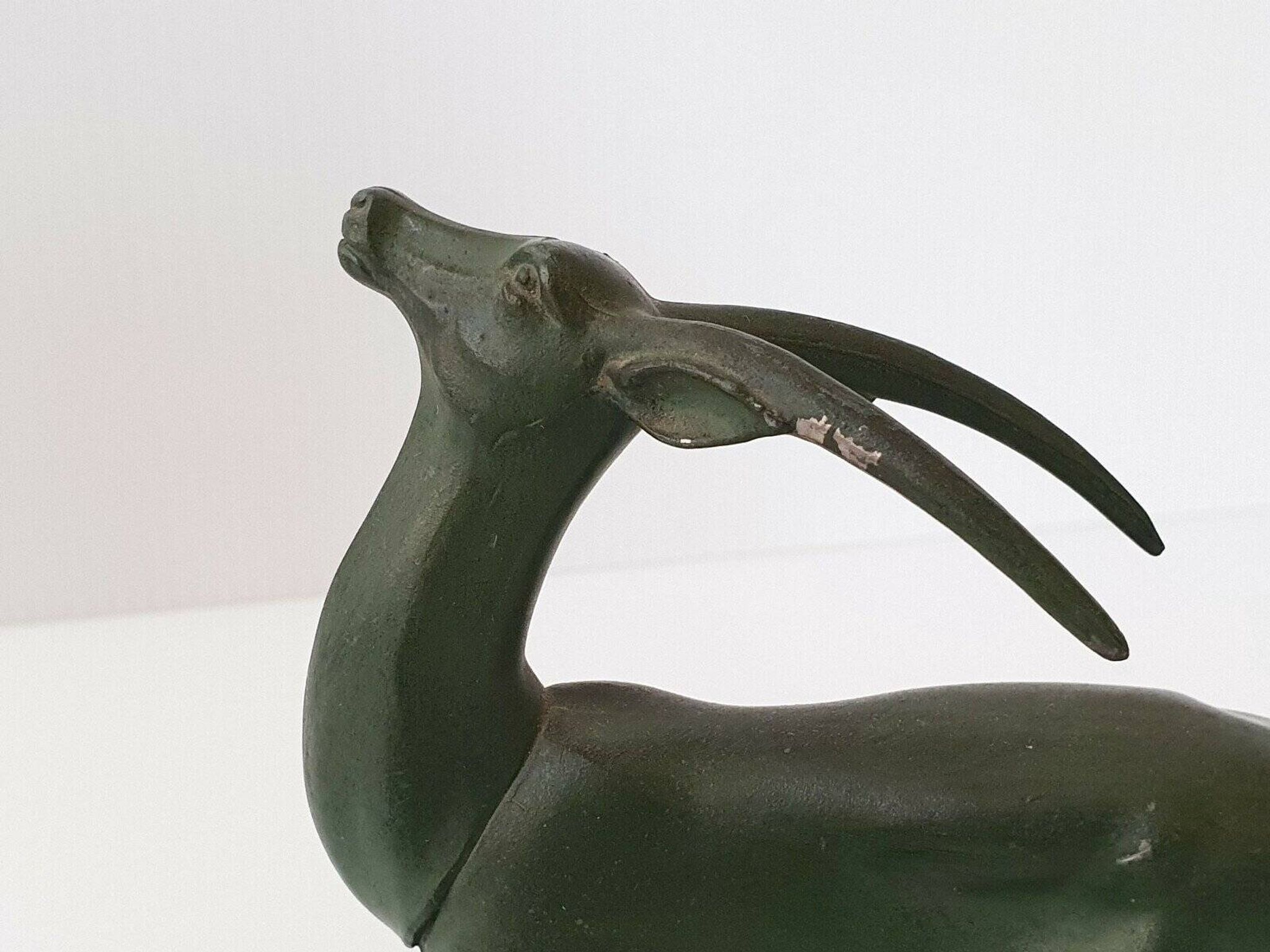Pair of vintage ibex bookends from 1940-1950 in marble and metal.