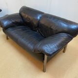 Pair of black leather sofas produced by Poltrona Frau, circa 1980/1990.