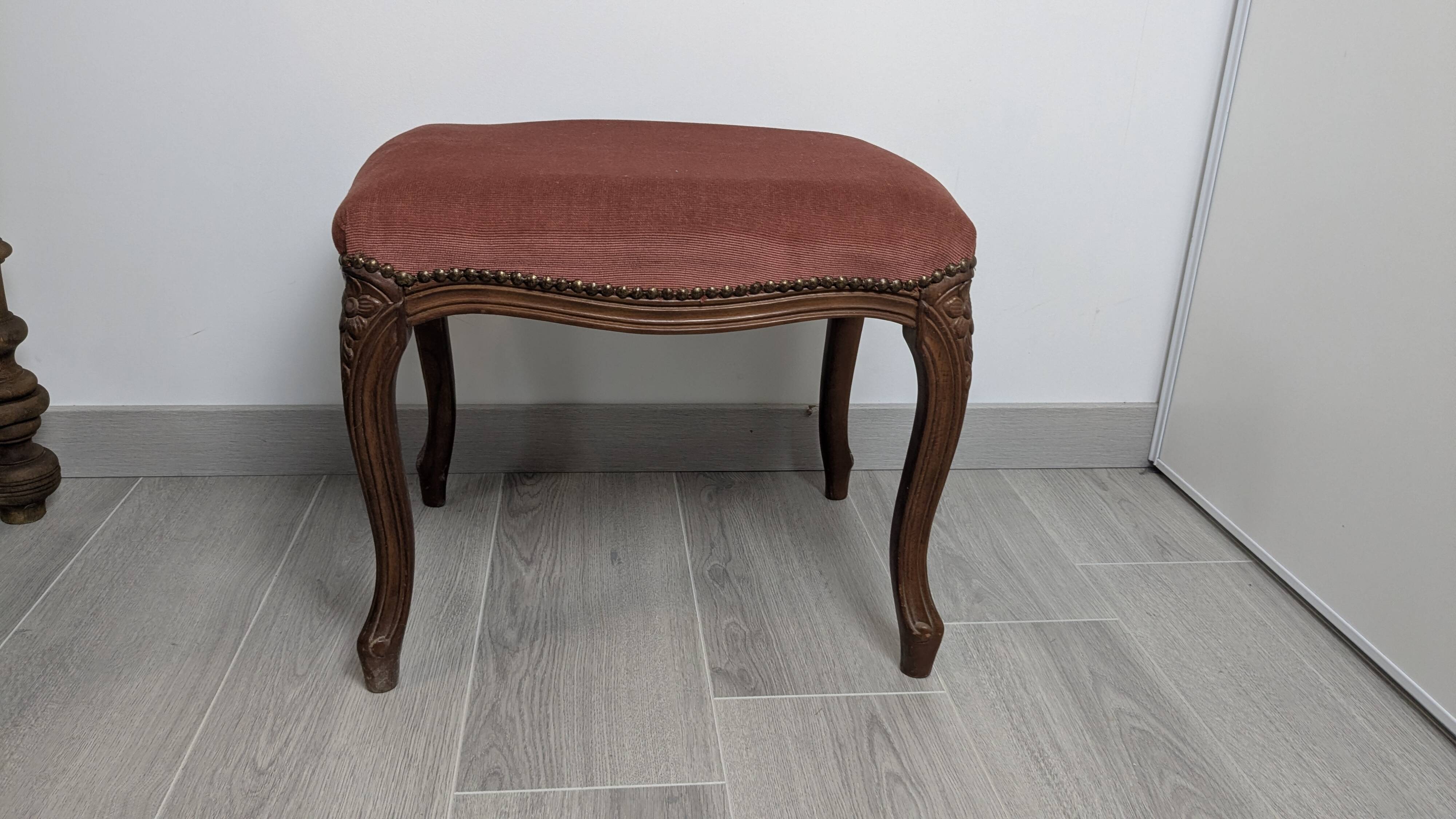 Louis XV stool — elegant curves and warm patina