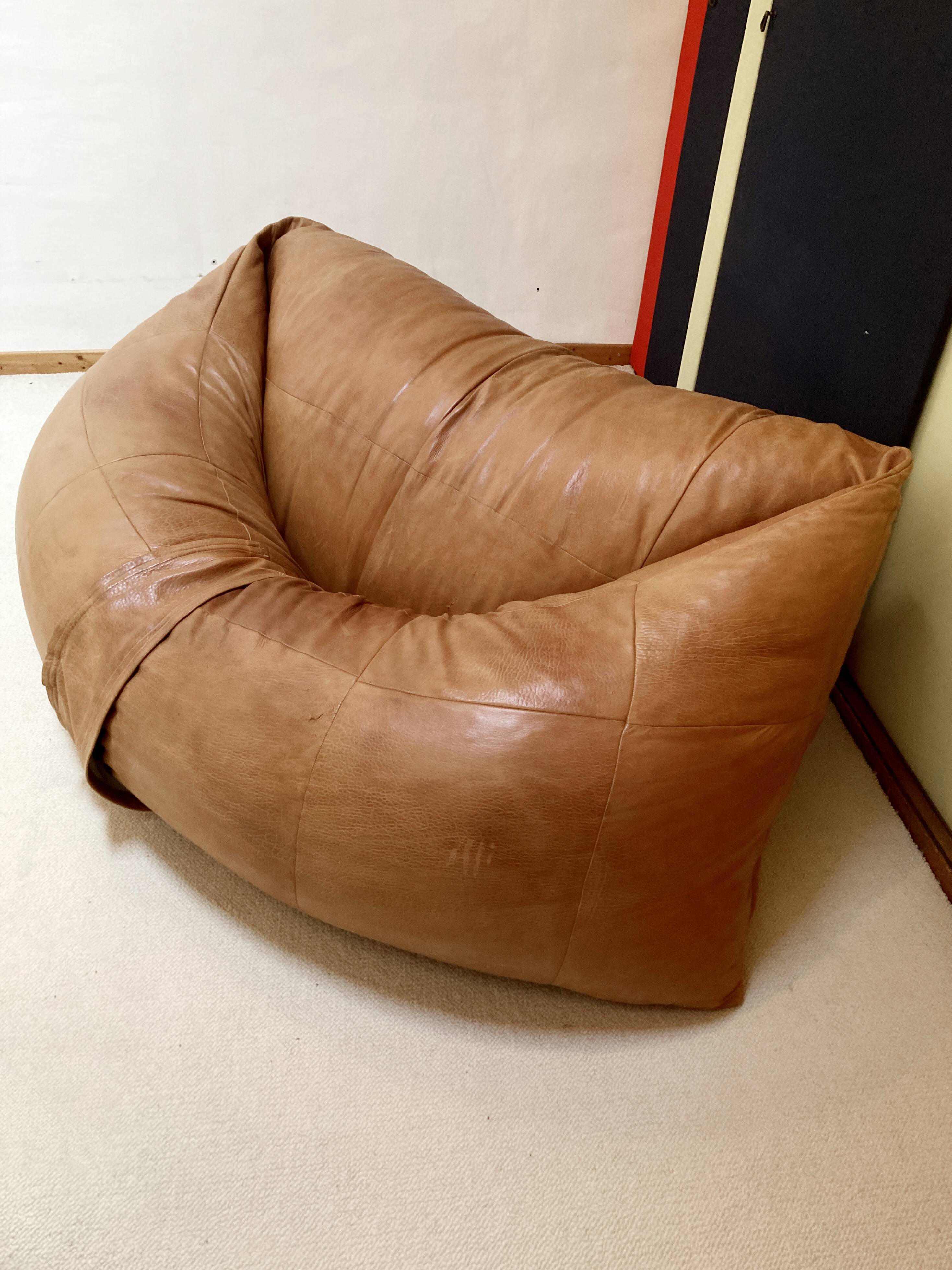 Two-seater leather pouf sofa by Raphaël Raffel for Honoré Paris