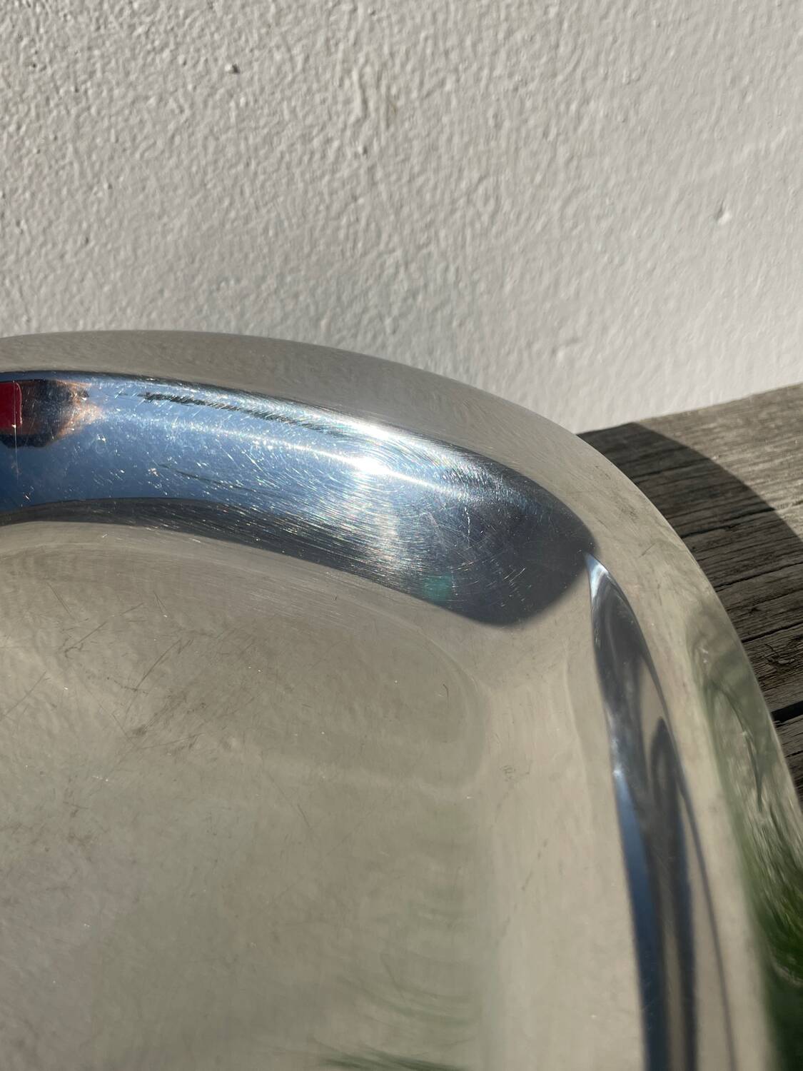 Oval stainless steel dish signed Rémi Letang