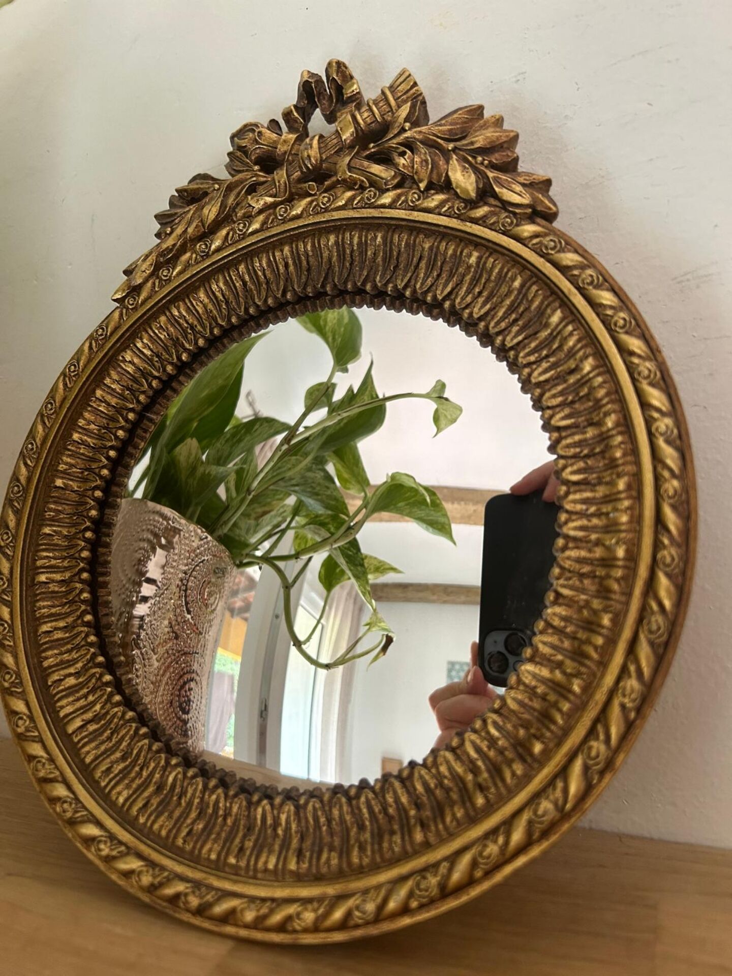 Round golden convex mirror with mouldings - witch's mirror
