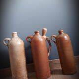 Trio of sandstone carafes with cove