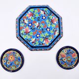 A flat bottom and two enamel bottle bottoms of Longwy