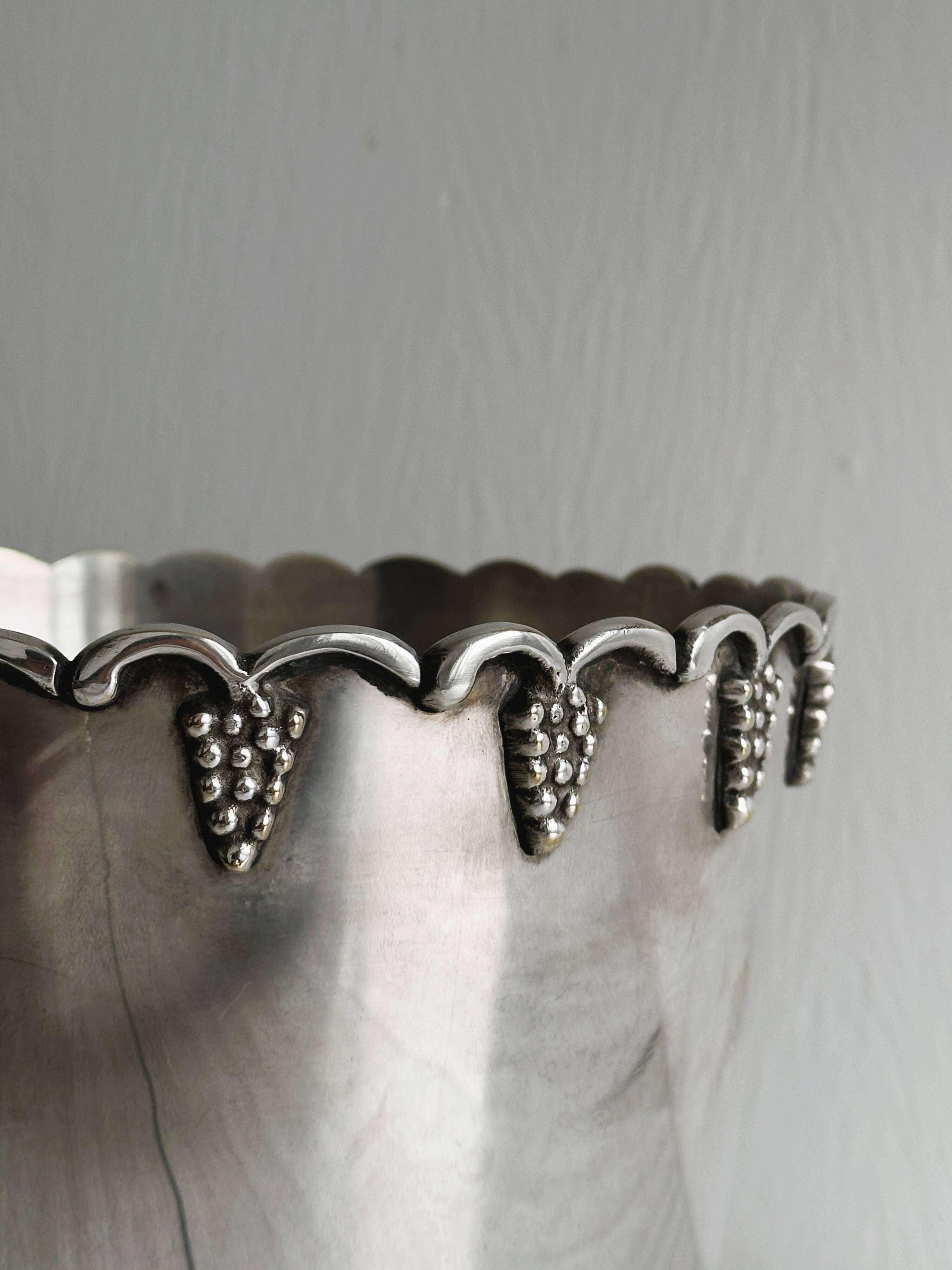 Antique champagne bucket in shiny silver metal