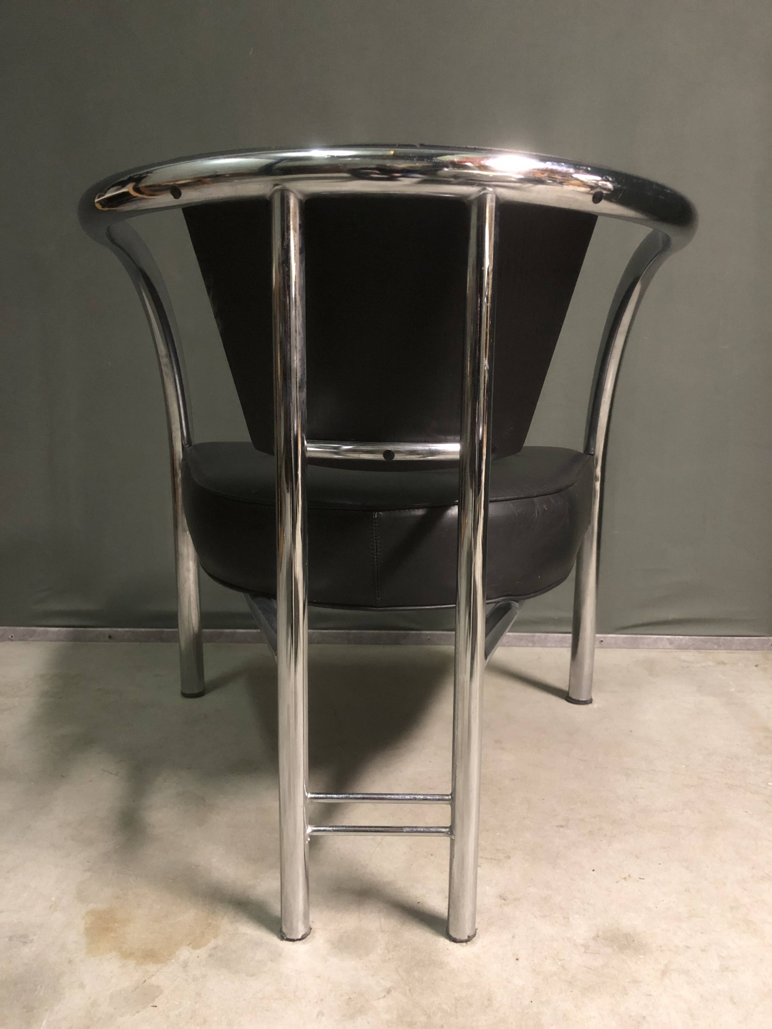 A pair of petite low armchairs by ronald cecil sportes for lumen center, 1987