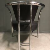 A pair of petite low armchairs by ronald cecil sportes for lumen center, 1987