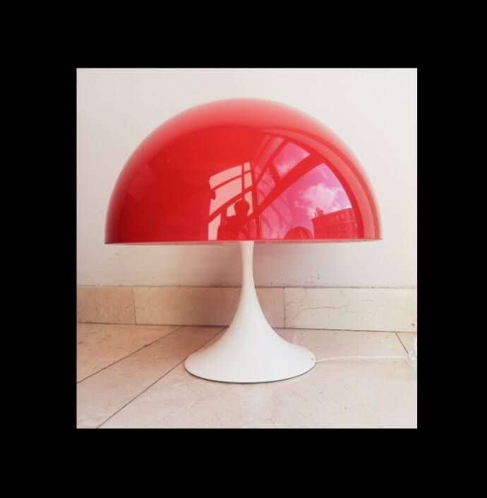 Two Miguel Milá lamps