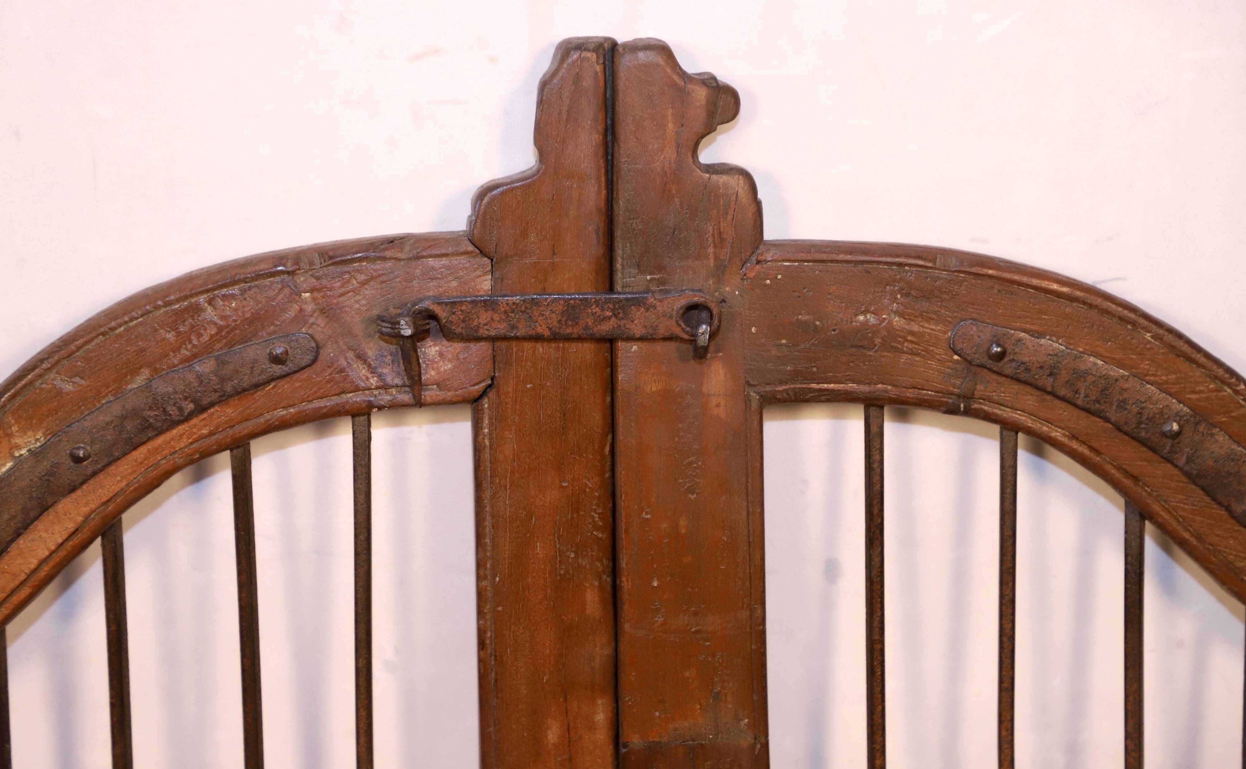 Old Burmese teak gate with openwork wrought iron panels