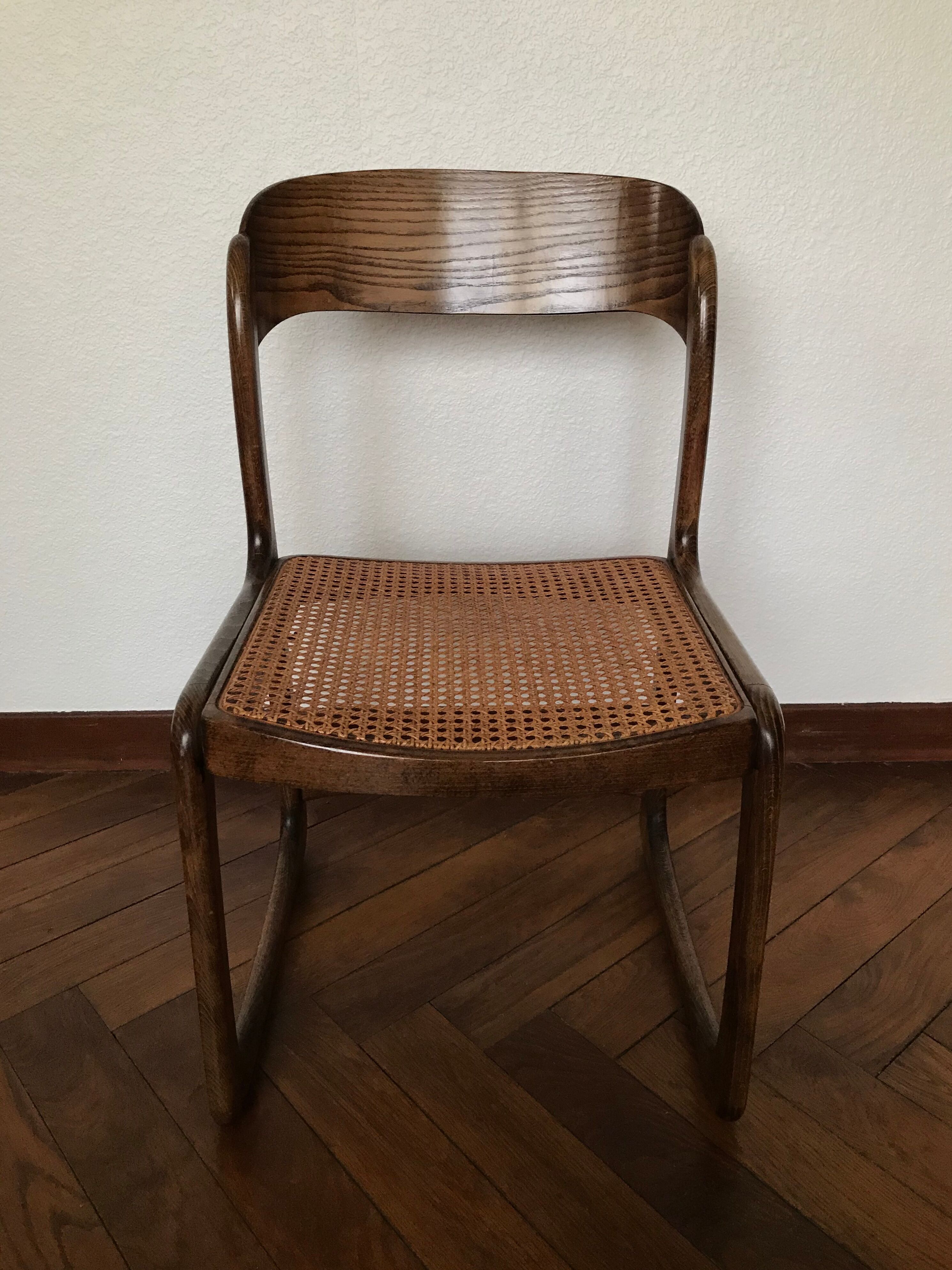 Series of 4 sleigh chairs in wicker, by Baumann