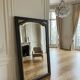 Miroir vintage glace biseautée en bois noir et doré