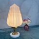 Art Deco lamp with pastel pink opaline globe.
