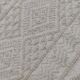 Hand-woven rug in natural wool