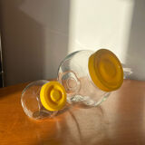 Pair of yellow vintage candy jars