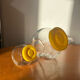 Pair of yellow vintage candy jars