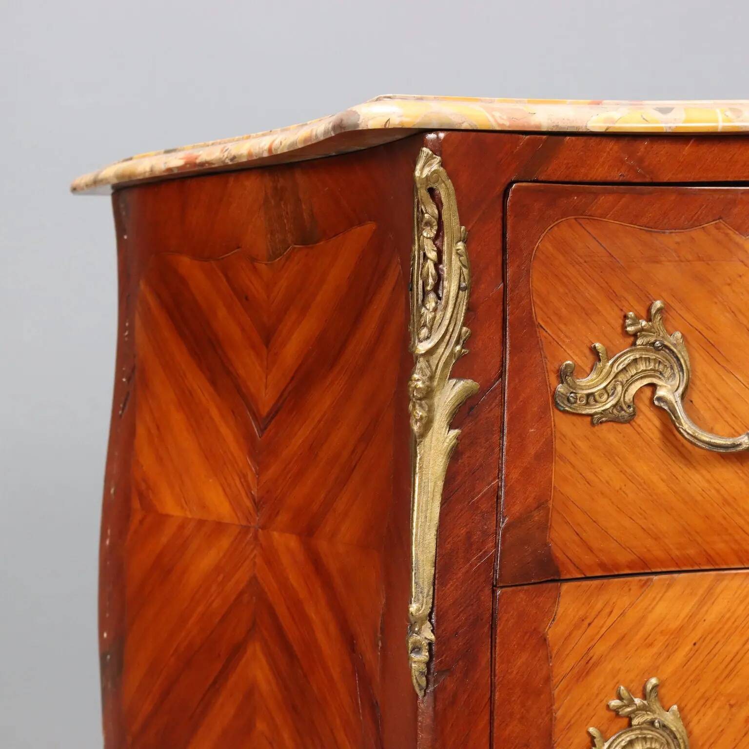 Antique commode in Baroque style made of mahogany, 20th century.