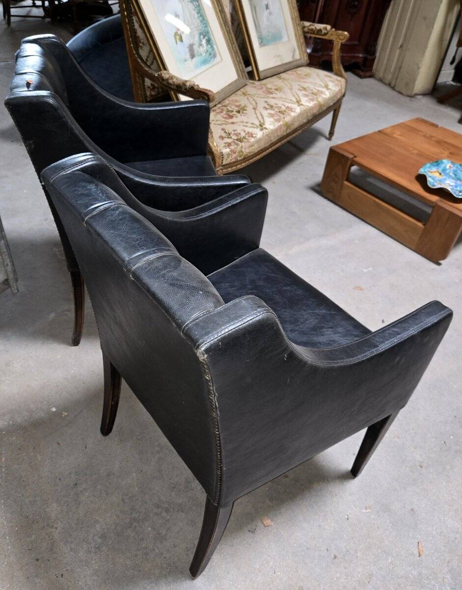 Paire de fauteuils en cuir noir, années 50