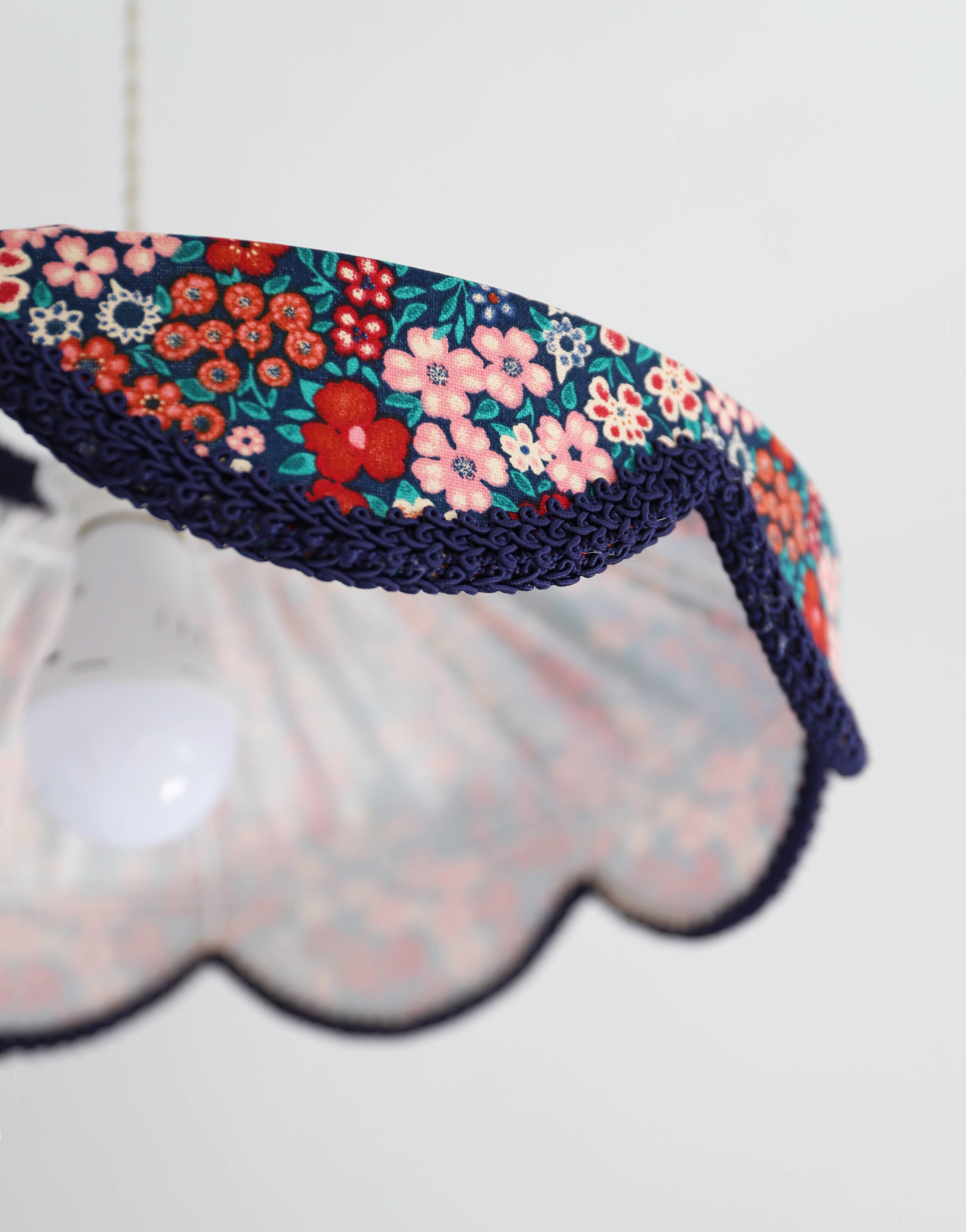 Cosette floral pendant light with "thousand flowers" print