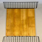 Floating wall shelf in oak veneer and black metal, 1960s.