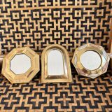 Trio of small brass mirrors