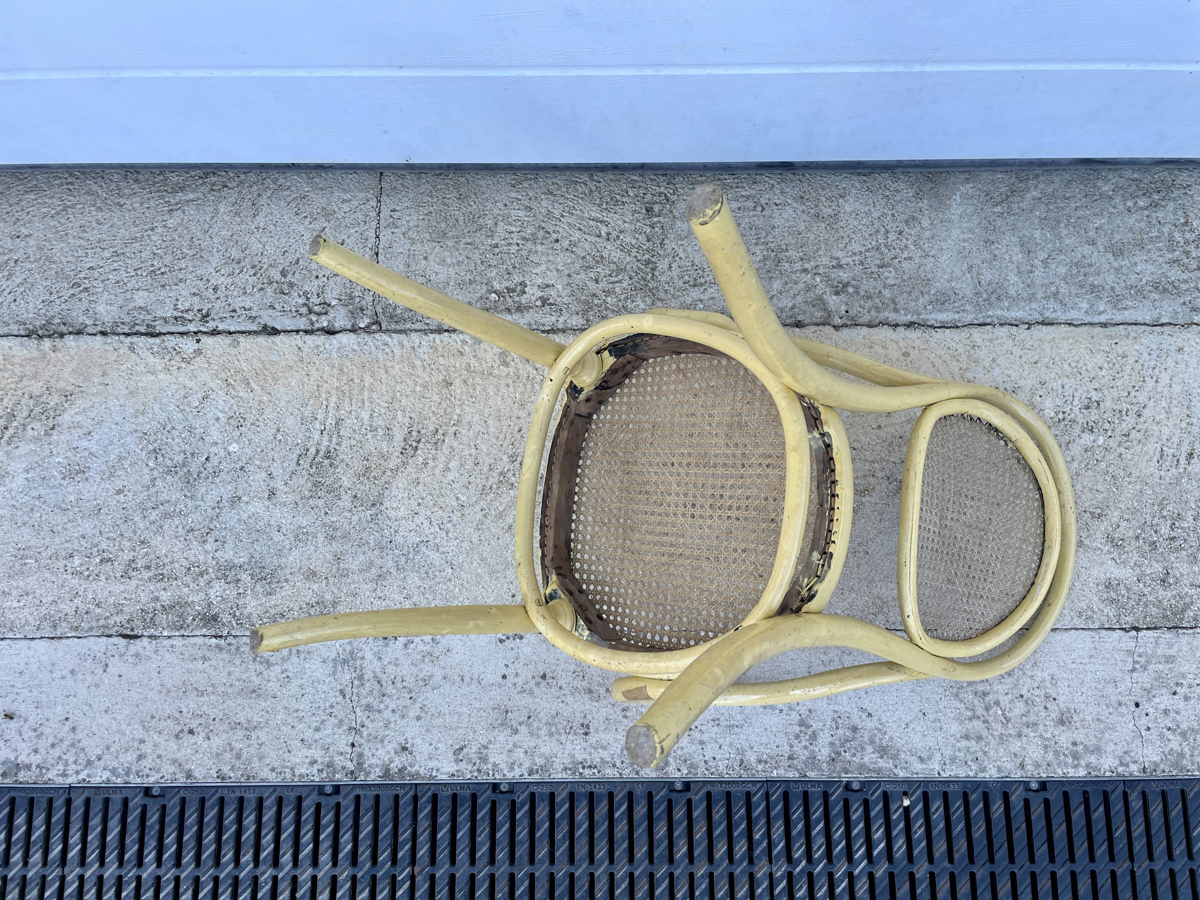 Old armchair Thonet canned wood