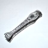 Rocaille sugar tongs in silver metal with lion claw medallion