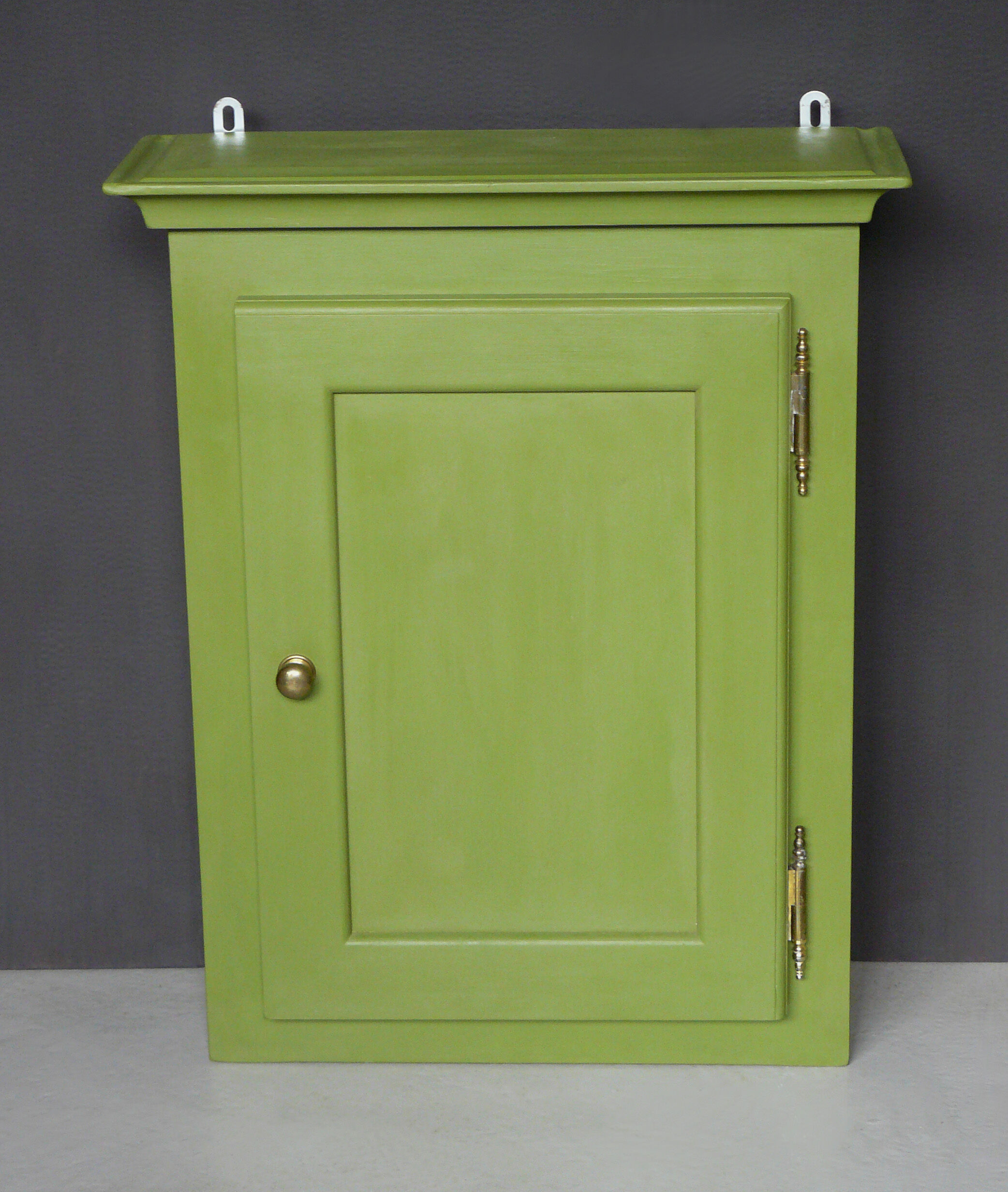 Green cabinet to hang painted and waxed