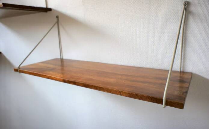 Modular wall shelves in exotic wood