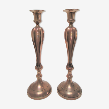 Pair of high solid brass candle holders domed ribbed barrels early twentieth century